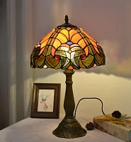 Настольная лампа Тиффани Ornament OFT841 Tiffany Lighting оранжевая разноцветная 1 лампа, основание коричневое металл в стиле тиффани орнамент