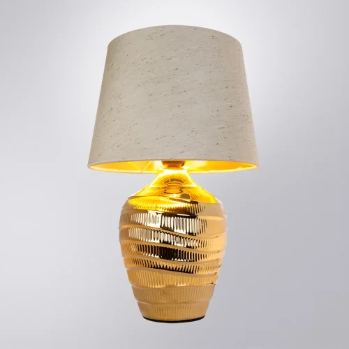 Настольная лампа Korfu A4003LT-1GO Arte Lamp бежевая 1 лампа, основание золотое керамика в стиле классический  фото 2