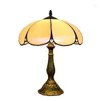 Настольная лампа Тиффани European OFT817 Tiffany Lighting бежевая 1 лампа, основание бронзовое коричневое металл в стиле тиффани орнамент