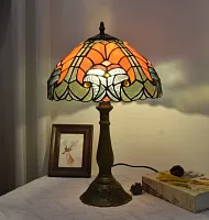 Настольная лампа Тиффани Ornament OFT839 Tiffany Lighting оранжевая разноцветная 1 лампа, основание коричневое металл в стиле тиффани орнамент