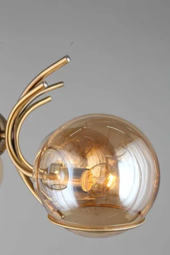 Люстра на штанге Girasole OML-28907-05 Omnilux прозрачная янтарная на 5 ламп, основание бронзовое в стиле современный шар фото 2